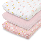 The Peanutshell daisy floral changing pad cover 3-pack for coordinated nursery decor.