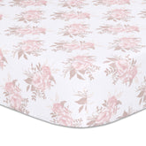 The Peanutshell Grace crib sheet with pink floral print offers a soft, comfortable sleep surface