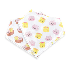 The Wee Bean bandana bib two-pack shown on a baby, absorbent and mess-ready during feeding.