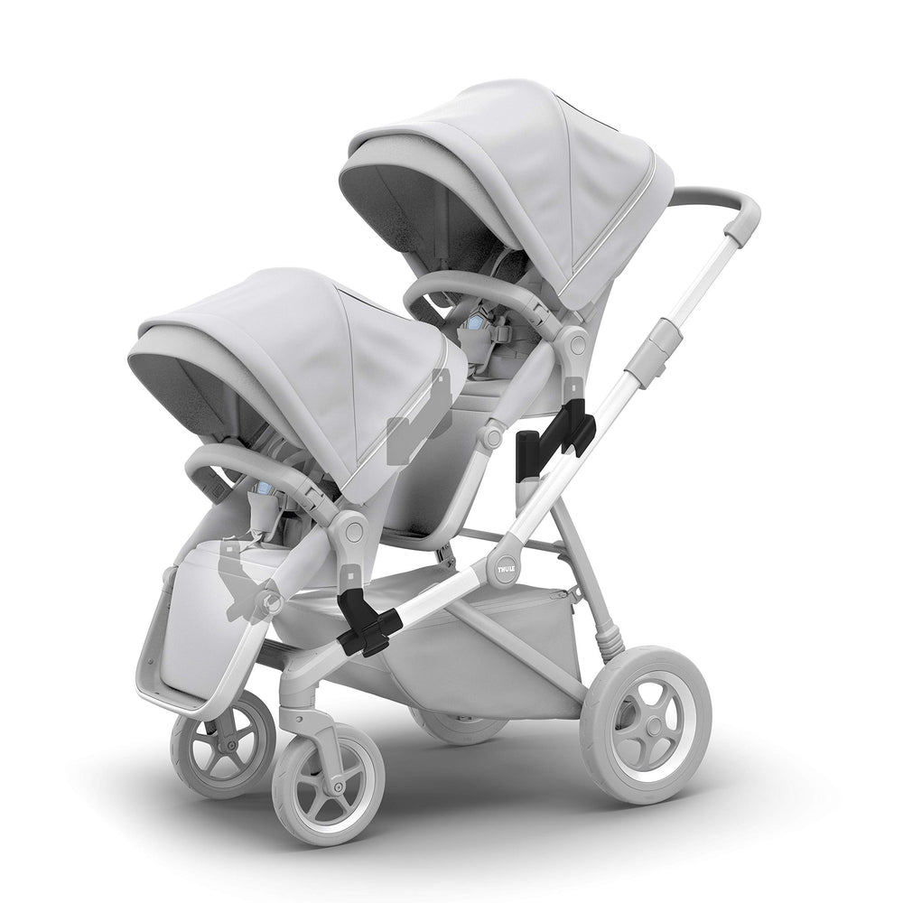 Thule Sleek Adapter Kit with upper and lower adapters for quick configuration.