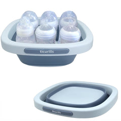 Ticurills collapsible wash basin, expanded to fit multiple bottles for easier cleaning.