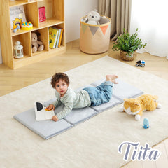 Removable cover on the Tiita nap mat ready for washing after messes.