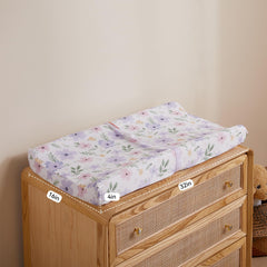 TILLYOU changing pad cover demonstrates secure fit for 32-34 by 16 inch contoured pads.