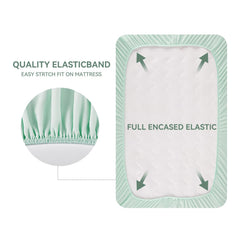 TILLYOU elastic band shows secure fit around mini crib mattress
