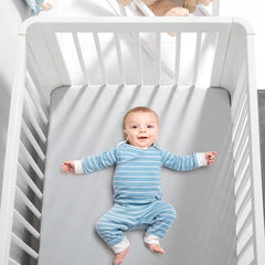 TILLYOU fitted crib sheet with 8-inch deep pockets stays secure.