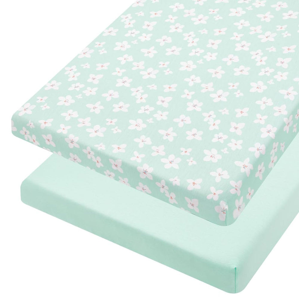 TILLYOU mini crib fitted sheet with floral pattern closeup, soft knit texture
