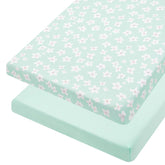 TILLYOU mini crib fitted sheet with floral pattern closeup, soft knit texture