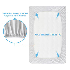 TILLYOU mini crib fitted sheet in light gray on a compact mattress with snug fit.