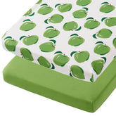 TILLYOU mini crib sheets with green apple pattern, soft and breathable for baby comfort.