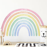 Tinideya rainbow wall decal assembly adds pastel charm to a kid's room.