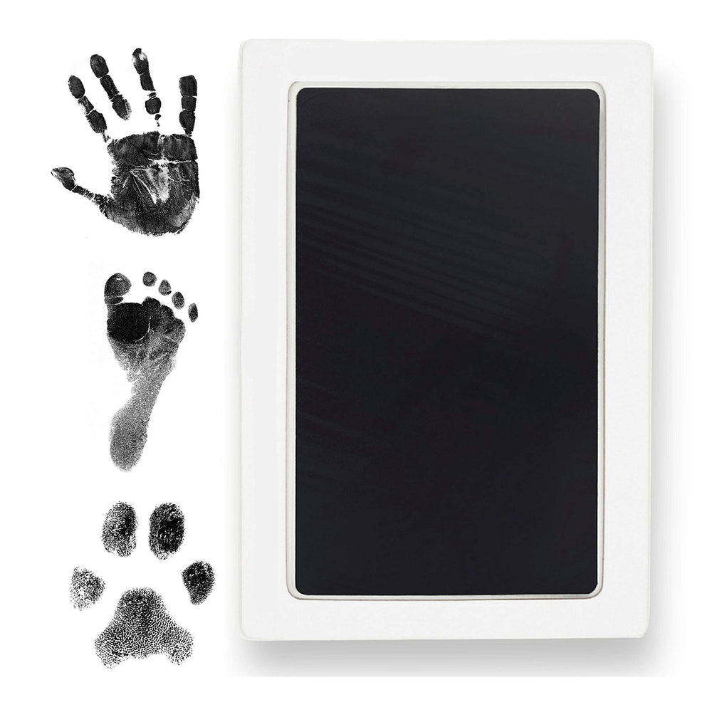Tiny Gifts Clean Touch inkpad safely captures a baby's hands for lasting keepsakes.
