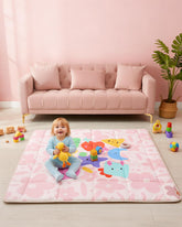 Tiny Marvels pink floral play mat folded for quick storage and transport.