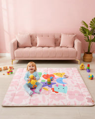 Tiny Marvels pink floral play mat folded for quick storage and transport.
