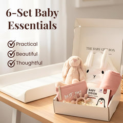 Tiny Treasures plush bunny included for comforting newborn snuggles.