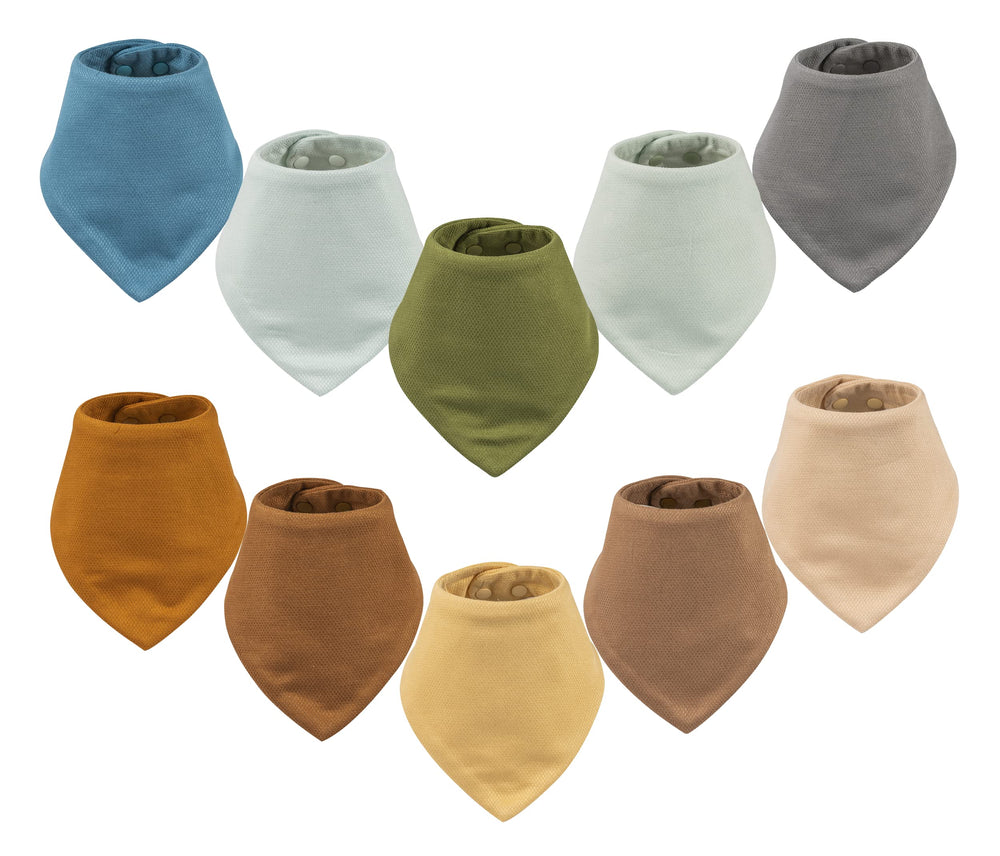 Tiny Twinkle bandana bibs with an absorbent outer layer catching spills.