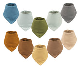 Tiny Twinkle bandana bibs with an absorbent outer layer catching spills.