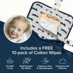 Tiny Twinkle changing pad clipped to a stroller for hands-free changes.