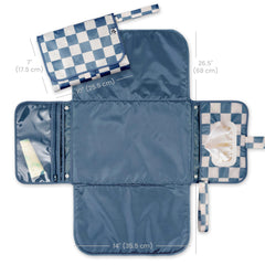 Tiny Twinkle changing pad with wipe pocket enables quick one-handed changes.
