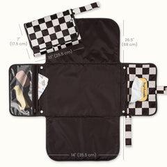 Tiny Twinkle changing pad featuring built-in wipes pocket for fast access.