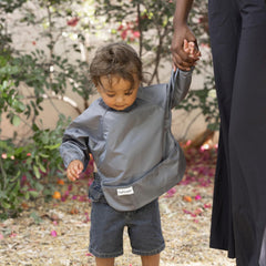 Elastic cuffs on Tiny Twinkle bib provide gentle, secure fit.