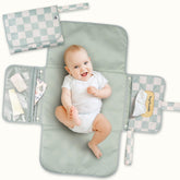 Tiny Twinkle foldable changing pad folded to 7x10 inches for travel use