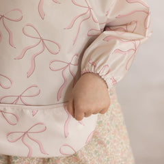 Tiny Twinkle elastic cuffs provide a soft, flexible fit during feeding.