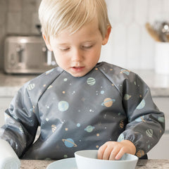 Tiny Twinkle long sleeve bib back view shows full coverage for messy eaters.