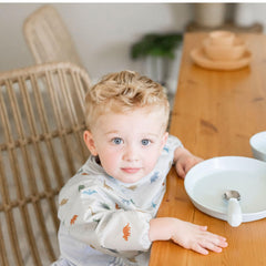 Tiny Twinkle machine-washable bib with easy-clean feature supports quick refreshes