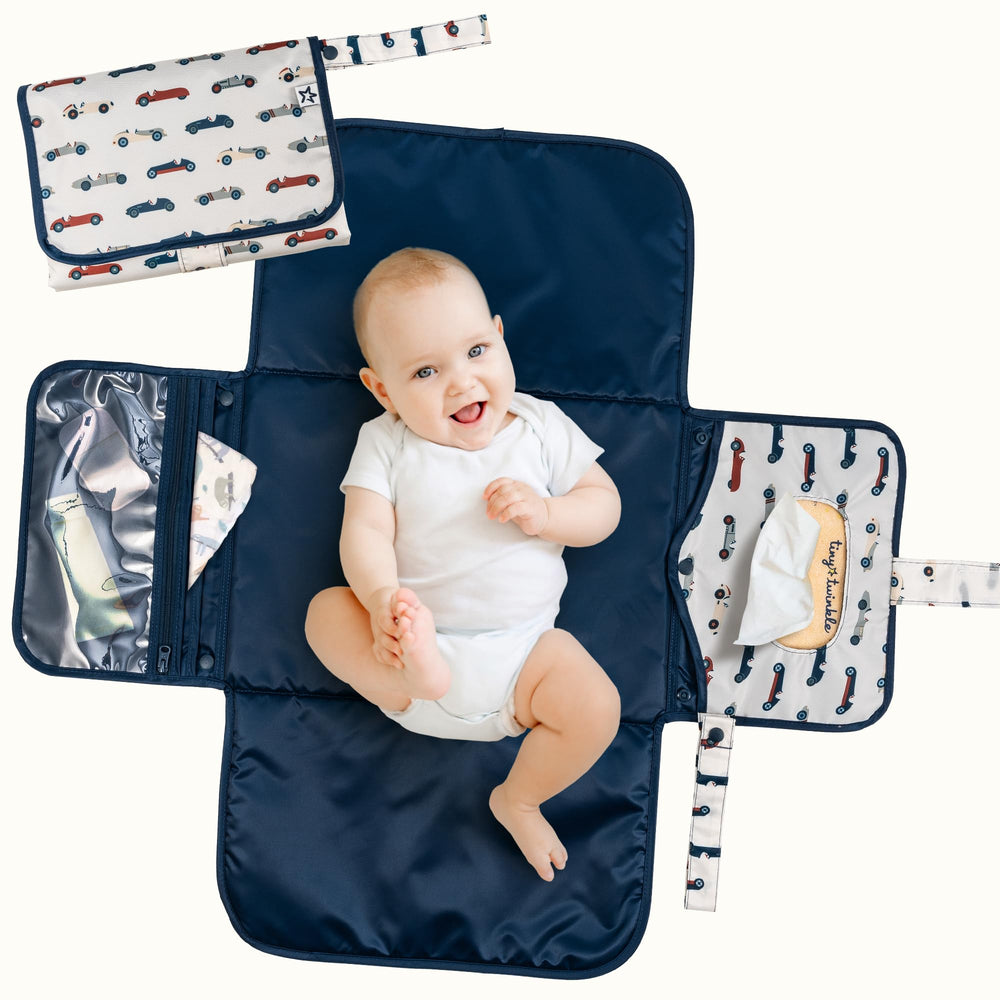 Tiny Twinkle portable changing pad in compact fold design for easy storage on the go.
