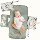 Tiny Twinkle portable changing pad with a waterproof surface for quick, clean diaper changes on the go.
