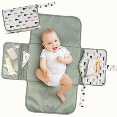 Tiny Twinkle portable changing pad with a waterproof surface for quick, clean diaper changes on the go.