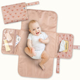 Tiny Twinkle portable diaper changing pad folded to 7x10 inches for travel use