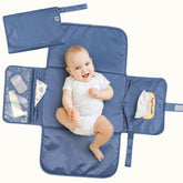 Tiny Twinkle portable diaper changing pad with waterproof surface for mess-free changes.