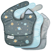 Tiny Twinkle space bib with catch pocket keeps messes contained during meals.