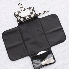 Tiny Twinkle stroller clip-loop keeps pad secure on the go.