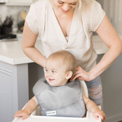 Tiny Twinkle wipeable bib cleans quickly after snacks.