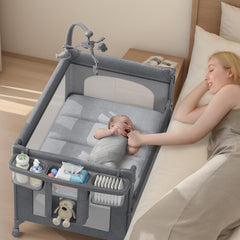 TinyGlow 4-in-1 bassinet-playyard in action offering a safe sleep and play space.