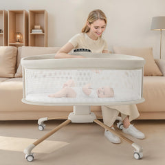 TinyGlow electric smart bassinet rocking feature shows gentle motion for baby sleep