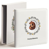 Tivellary leather embroidery baby book front cover showing forest design and premium craftsmanship