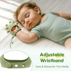 TOHIBEE adjustable fit teether secures on baby's hand
