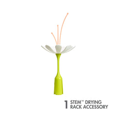 TOMY Boon Stem holds baby bottles for organized drying after washing.