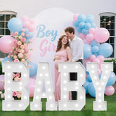 Tongjoy baby marquee letters illuminate a baby shower backdrop with warm, inviting glow