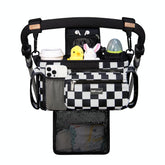 TopDesign universal stroller organizer keeps essentials within reach during walks.