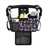 TOPDesign stroller organizer with mesh bag for quick diaper storage during outings.