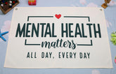 Topthink mental health banner on beige wall adds gentle inspiration for kids.