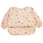 Torange waterproof long sleeve bib worn by baby during meal time to minimize mess