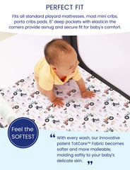 Mini crib sheet stretched securely over mattress for snug fit.