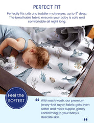 TotAha Sea Animal crib sheet on a mattress with stretch seams for secure fit.