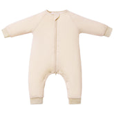 TOTBASIC baby sleep sack with feet in oat color showing foot openings for easy movement and warmth