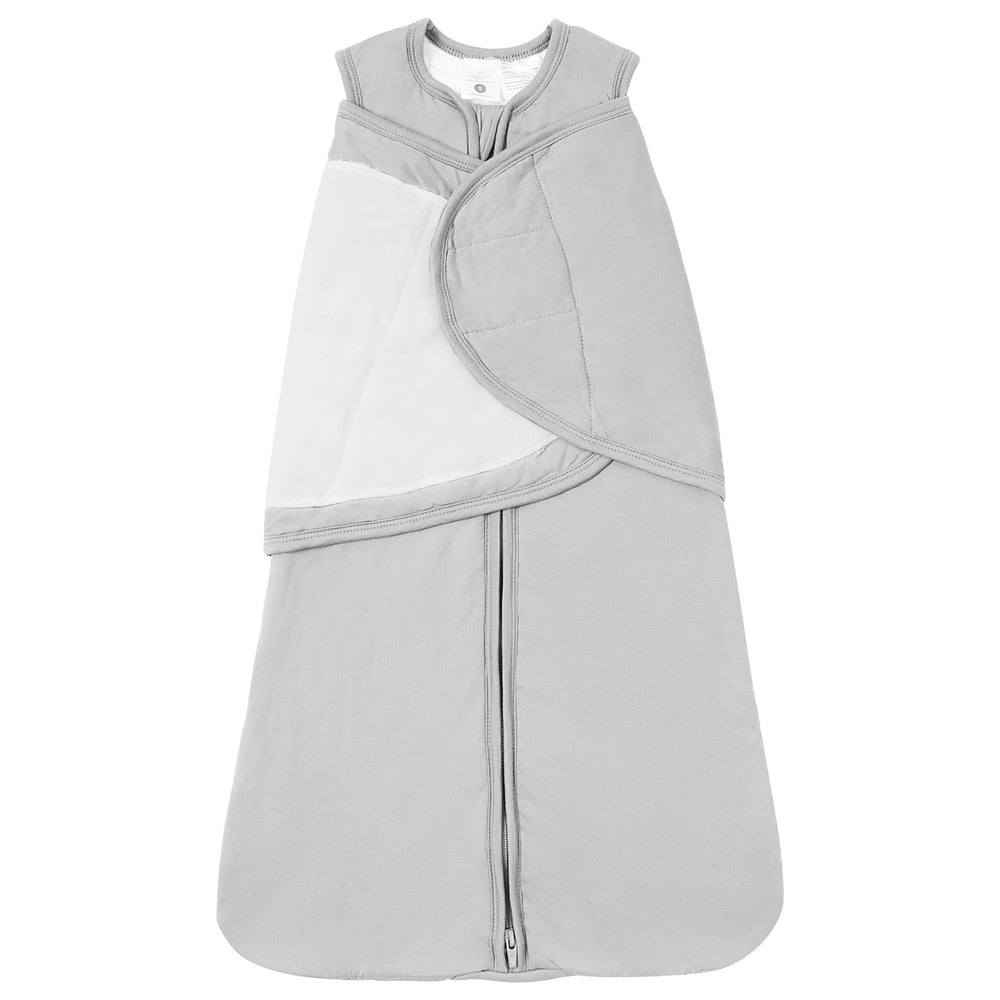 TOTBASIC Storm baby swaddle in initial arms-in mode for calm sleep.